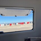 Aus dem Dinettefenster den Strand sehen